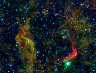 Infrared images from NASA's Spitzer Space Telescope and Wide-field Infrared Survey Explorer are combined in this image of RCW 86, the dusty remains of the oldest documented example of an exploding star, or supernova.