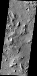 NASA's Mars Odyssey spacecraft captured this image on Feb. 19, 2012, 10 years to the day after the camera recorded its first view of Mars. This image covers an area in the Nepenthes Mensae region north of the Martian equator. 