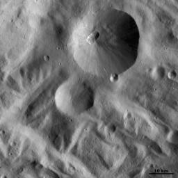 This image NASA's Dawn spacecraft shows is located in Vesta's Rheasilvia quadrangle, near Vesta's south pole. Severina crater has a fresh, sharp rim and a smaller, presumably younger, crater on its rim.