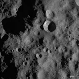 This image from NASA's Dawn spacecraft shows Arruntia crater, located in asteroid Vesta's Bellicia quadrangle, in Vesta's northern hemisphere.