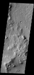 This image from NASA's 2001 Mars Odyssey spacecraft shows the region just northwest of Gale Crater on Mars. This region is dissected by small channels.