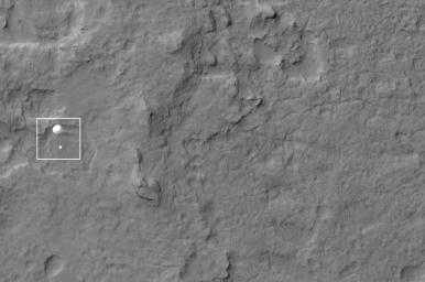NASA's Curiosity rover and its parachute were spotted by NASA's Mars Reconnaissance Orbiter as Curiosity descended to the surface on Aug. 5 PDT (Aug. 6 EDT). Curiosity and its parachute are in the center of the white box.