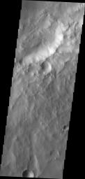 The landslide deposit in this image from NASA's 2001 Mars Odyssey spacecraft is located in an unnamed crater in Xanthe Terra.