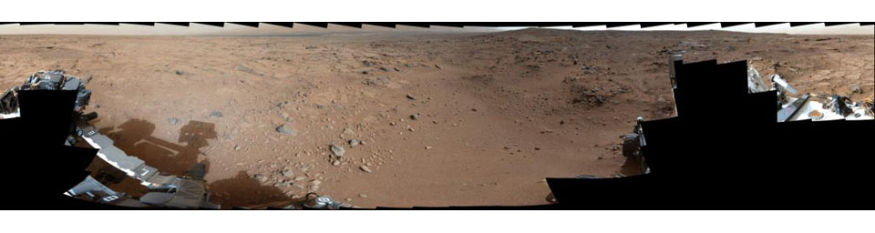 On Nov. 22, 2012, or sol 106, NASA's Mars rover Curiosity was near a location called 'Point Lake' for an overlook of a shallow depression called 'Yellowknife Bay' which is in the left third of this scene, in the middle distance.