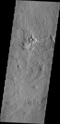 This region of arcuate (or curved) fractures is located north of Apollinaris Mons as seen by NASA's 2001 Mars Odyssey spacecraft.
