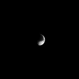 Iapetus is a moon of extreme contrasts. The light and dark features give the moon a distinctive 'yin and yang' appearance in this image from NASA's Cassini spacecraft.