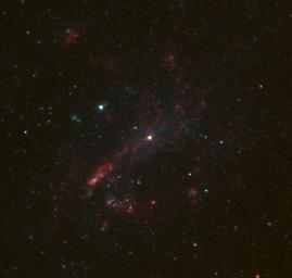 The galaxy NGC 4395 is shown here in infrared light, captured by NASA's Spitzer Space Telescope. This dwarf galaxy is relatively small in comparison with our Milky Way galaxy, which is nearly 1,000 times more massive.