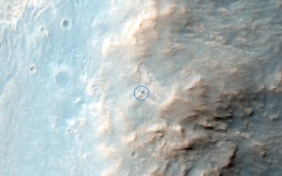 This is the latest image of NASA's Opportunity rover at Solander Point, where it spend a few week investigation Pinnacle rock (the 'jelly donut') that was flipper over by the rover wheel. This observation is from NASA's Mars Reconnaissance Orbiter.