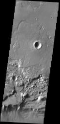 Triangular shaped deposits at cliff edges are termed alluvial fans. Alluvial fans typically form in arid regions were water flow is limited, so deposits of material are not washed away as seen by NASA's 2001 Mars Odyssey spacecraft.
