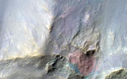 This image covers a 26-kilometer-wide impact crater northeast of the Hellas impact basin as observed by NASA's Mars Reconnaissance Orbiter.