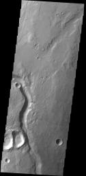 This image captured by NASA's 2001 Mars Odyssey spacecraft shows an unnamed channel located on the northwest margin of Arabia Terra.