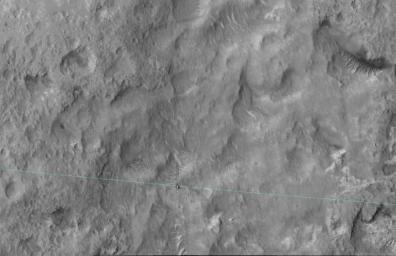 This June 27, 2014, image from the HiRISE camera on NASA's Mars Reconnaissance Orbiter shows NASA's Curiosity Mars rover on the rover's landing-ellipse boundary, which is superimposed on the image.