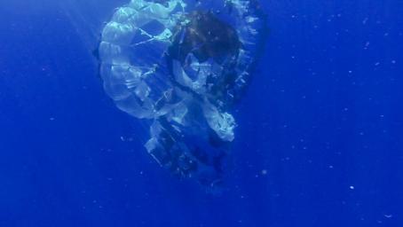 Tears are visible in the parachute from NASA's Supersonic Disk Sail Parachute, which did not deploy as expected. The photo was obtained by Navy divers during recovery of the LDSD test vehicle and parachute.