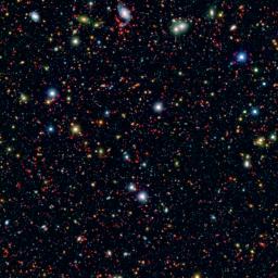 Millions of galaxies populate the patch of sky known as the COSMOS field, short for Cosmic Evolution Survey, a portion of which is shown here. Even the smallest dots in this image are galaxies, some up to 12 billion light-years away.