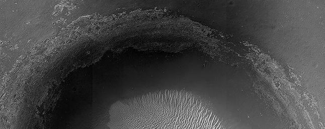 This crater, seen by NASA's Mars Reconnaissance Orbiter, is located in Meridiani Planum, about 20-kilometers northwest of where NASA's Opportunity rover landed in 2004 and about 42-kilometers northwest of Endeavour Crater's rim.