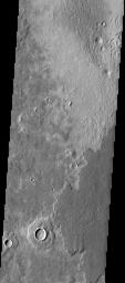 This image captured by NASA's 2001 Mars Odyssey spacecraft shows layering in the plains that comprise Utopia Planitia.