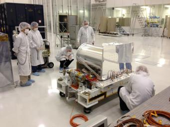 The Optical PAyload for Lasercomm Science (OPALS) undergoes final inspection prior to shipment to NASA's Kennedy Space Center. OPALS was launched to the International Space Station from Cape Canaveral Air Force Station in Florida on April 18, 2014.