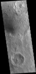 This image captured by NASA's 2001 Mars Odyssey spacecraft shows sand dunes on the floor of an unnamed crater in Arabia Terra.