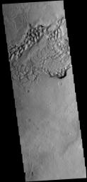 The hills in this image captured by NASA's 2001 Mars Odyssey spacecraft are part of Avernus Colles.