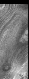 This image captured by NASA's 2001 Mars Odyssey spacecraft shows layering in the south polar cap.