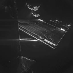 A composite image from a camera on ESA's Rosetta mission's Philae comet lander shows a solar array, with comet 67P/Churyumov-Gerasimenko in the background.
