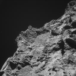 Some relatively rough terrain on the nucleus of comet 67P/Churyumov-Gerasimenko appears in this image taken by the navigation camera on the European Space Agency's Rosetta spacecraft in the second half of October 2014.