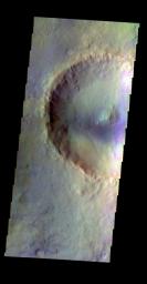 The THEMIS VIS camera contains 5 filters. The data from different filters can be combined in multiple ways to create a false color image. This false color image from NASA's 2001 Mars Odyssey spacecraft shows an unnamed crater in Acidalia Planitia.