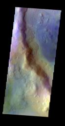 The THEMIS VIS camera contains 5 filters. The data from different filters can be combined in multiple ways to create a false color image. This false color image from NASA's 2001 Mars Odyssey spacecraft shows part of Renaudot Crater.