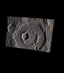 This image from NASA's MESSENGER spacecraft features a color view of the peak-ringed crater Aksakov. The inner ring of Aksakov is superimposed by another crater.