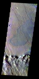 The THEMIS VIS camera contains 5 filters. Data from different filters can be combined in multiple ways to create a false color image. This image from NASA's 2001 Mars Odyssey spacecraft shows lava flow from Solis Planum has entered an unnamed crater.