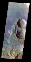 The THEMIS VIS camera contains 5 filters. The data from different filters can be combined in multiple ways to create a false color image. This false color image from NASA's 2001 Mars Odyssey spacecraft shows craters in Terra Cimmeria.