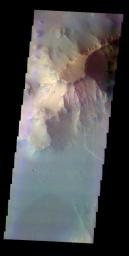 The THEMIS VIS camera contains 5 filters. The data from different filters can be combined in multiple ways to create a false color image. This image from NASA's 2001 Mars Odyssey spacecraft shows part of the northern cliff face of Ganges Chasma.