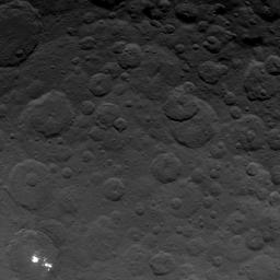 This image, taken by NASA's Dawn spacecraft, shows the brightest spots on dwarf planet Ceres from an altitude of 2,700 miles (4,400 kilometers). The image, with a resolution of 1,400 feet (410 meters) per pixel, was taken on June 24, 2015.