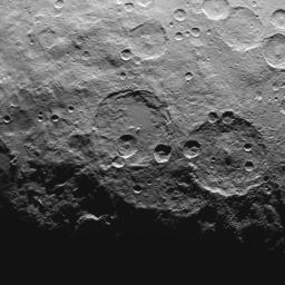 This image, taken by NASA's Dawn spacecraft, shows high southern latitudes on Ceres from an altitude of 2,700 miles (4,400 kilometers). Zadeni crater, measuring about 80 miles (130 kilometers) across, is on the right side of the image.