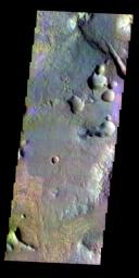The THEMIS VIS camera contains 5 filters. The data from different filters can be combined in multiple ways to create a false color image. This image from NASA's 2001 Mars Odyssey spacecraft shows part of Margaritifer Terra near Margaritifer Chaos.