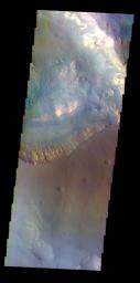 The THEMIS VIS camera contains 5 filters. The data from different filters can be combined in multiple ways to create a false color image. This image from NASA's 2001 Mars Odyssey spacecraft shows part of Capri Mensa and Capri Chasma.