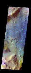 The THEMIS VIS camera contains 5 filters. Data from different filters can be combined in multiple ways to create a false color image. This image from NASA's 2001 Mars Odyssey spacecraft shows mesas and channels on the margin of Terra Sabaea.