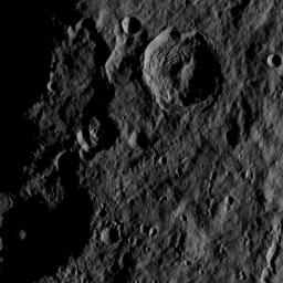 This image, taken by NASA's Dawn spacecraft, shows the surface of dwarf planet Ceres from an altitude of 915 miles (1,470 kilometers). The image, with a resolution of 450 feet (140 meters) per pixel, was taken on August 27, 2015.