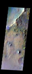 The THEMIS VIS camera contains 5 filters. The data from different filters can be combined in multiple ways to create a false color image. This image from NASA's 2001 Mars Odyssey spacecraft shows part of the rim of Tyndall Crater.