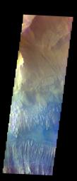 The THEMIS VIS camera contains 5 filters. The data from different filters can be combined in multiple ways to create a false color image. This image from NASA's 2001 Mars Odyssey spacecraft shows part of of Hebes Chasma.