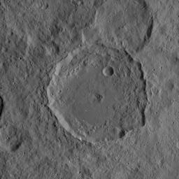 This image, taken on Oct. 6, 2015 from NASA's Dawn mission, shows the 52-mile-wide (84 kilometer-wide) crater on Ceres named Gaue. This medium-sized basin has a relatively fresh rim with terraced walls and a smooth floor.