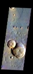The THEMIS camera contains 5 filters. The data from different filters can be combined in multiple ways to create a false color image. This image captured by NASA's 2001 Mars Odyssey spacecraft shows part of Ophir Planum.