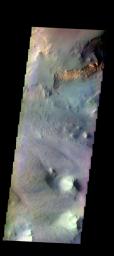 The THEMIS camera contains 5 filters. The data from different filters can be combined in multiple ways to create a false color image. This image captured by NASA's 2001 Mars Odyssey spacecraft shows part of Eos Chasma.