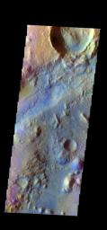 The THEMIS camera contains 5 filters. The data from different filters can be combined in multiple ways to create a false color image. This image captured by NASA's 2001 Mars Odyssey spacecraft shows part of Nili Fossae.