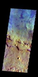 The THEMIS camera contains 5 filters. The data from different filters can be combined in multiple ways to create a false color image. This image captured by NASA's 2001 Mars Odyssey spacecraft shows part of an unnamed crater in Terra Sirenum.