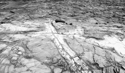 This view from NASA's Curiosity Mars rover shows an example of discoloration closely linked to fractures in the Stimson formation sandstone on lower Mount Sharp. The pattern is evident along two perpendicular fractures.