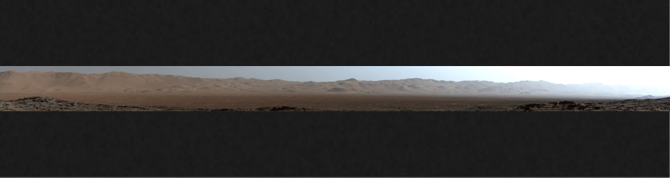 This early-morning view from NASA's Curiosity Mars rover covers a field of view of about 130 degrees of the inner wall of Gale Crater. The rover's location was on the 'Naukluft Plateau' of lower Mount Sharp.