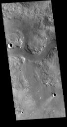 This image captured by NASA's 2001 Mars Odyssey spacecraft shows a portion of Granicus Valles.