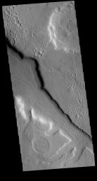 This image captured by NASA's 2001 Mars Odyssey spacecraft shows a portion of an unnamed channel located on the northern margin of Arabia Terra.