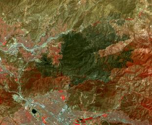 This image, captured by NASA's Terra spacecraft in July, 2016, shows the Sand fire, in the mountains northwest of Los Angeles, CA which burned more than 39,000 acres, destroyed 18 houses, and caused one fatality.